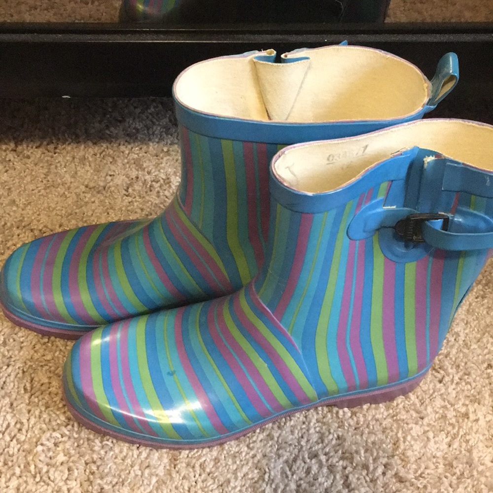 Rainbow colored rain boots
